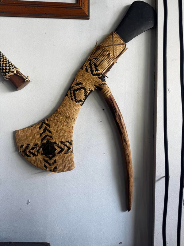 Tribal weaponry stone and wood adze with flax cover $80