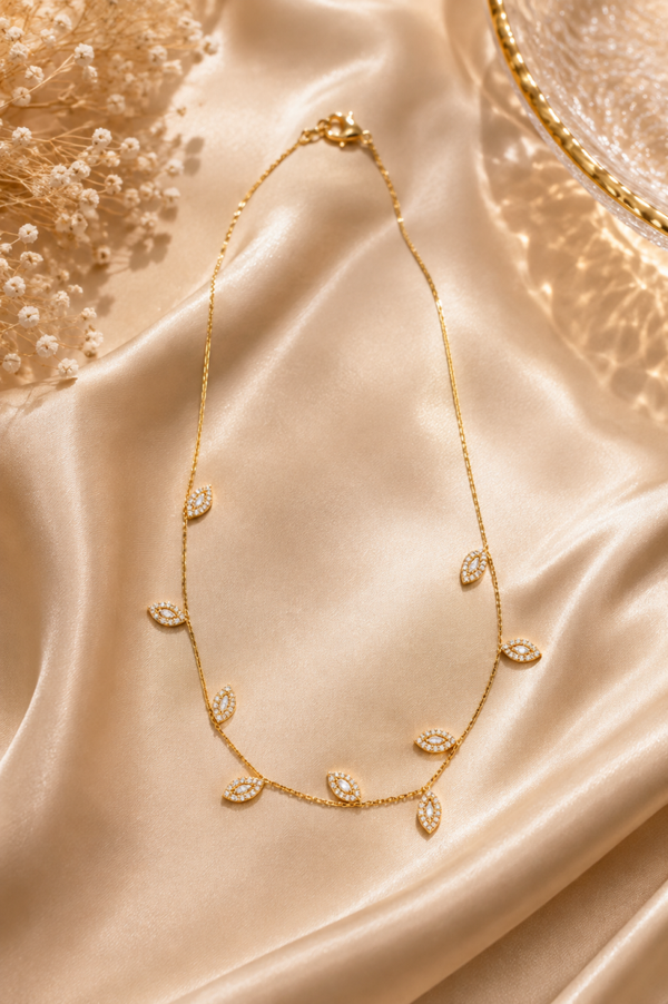 Collana FOGLIE LUMINOSE in acciaio inossidabile regolabile, con zirconi