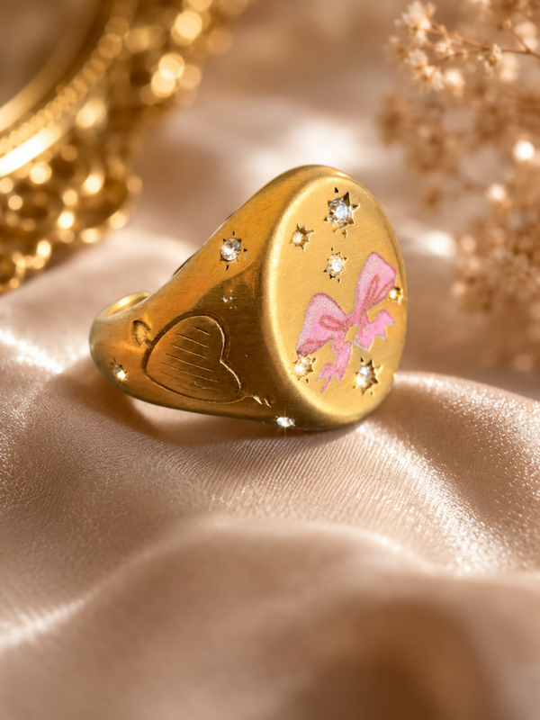 Anello FIOCCO in acciaio inossidabile con fiocco rosa , regolabile