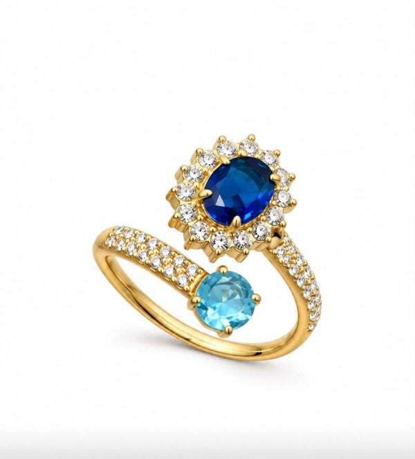 Anello regolabile QUEEN  con zirconi blu royal e celesti
