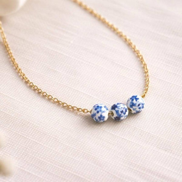 Collana old british regolabile in acciaio con punti decori bianco e blu