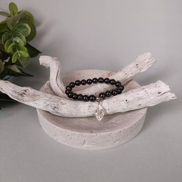 Bracelet Élastique en Hématite et Charm Feuille Argentée