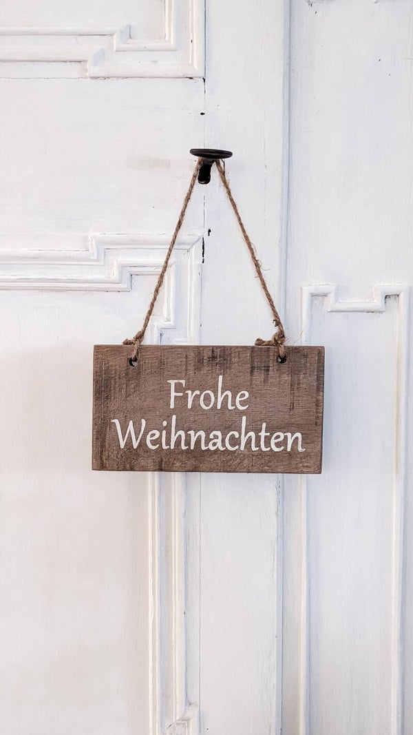 Schild "Frohe Weihnachten"