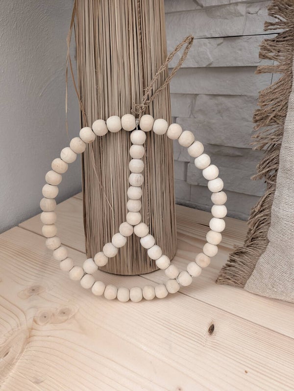 Peacezeichen aus Holzkugeln