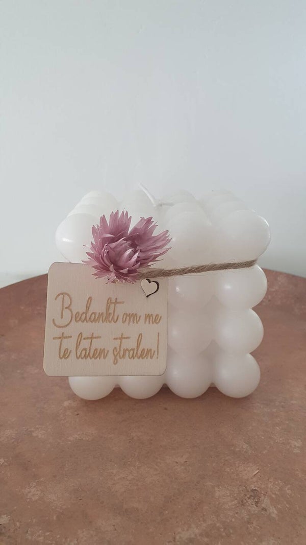Bolletjeskaars met label