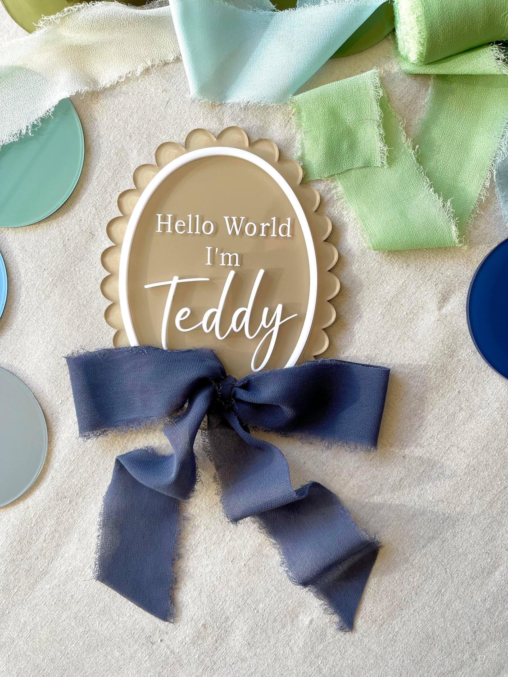 "Hello world I'm" baby name scalloped edge acrylic plaque with ribbon