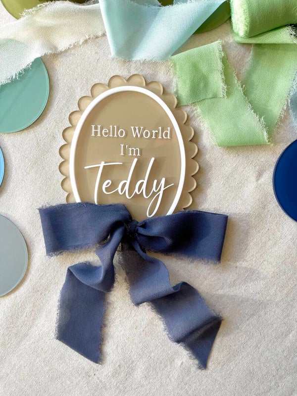 "Hello world I'm" baby name scalloped edge acrylic plaque with ribbon