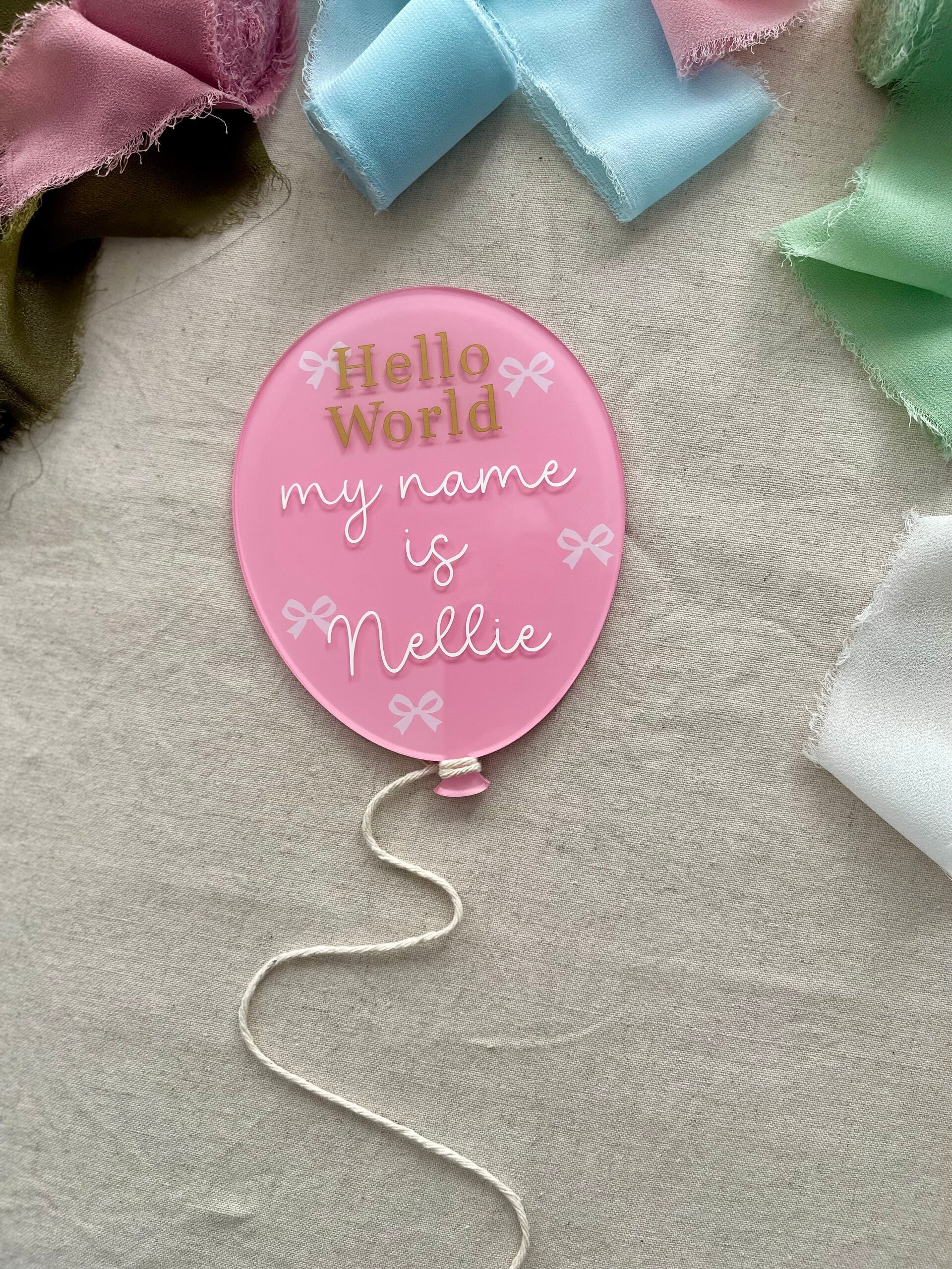 "Hello world my name is" baby name balloon plaque with bows