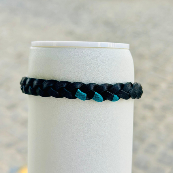 Pulsera de hombre de acero y piel negra trenzada con cordón verde
