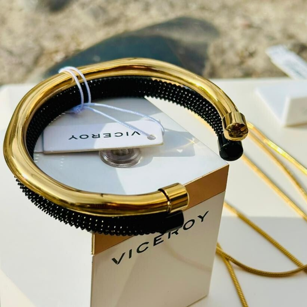 Pulsera de acero rígida doble en Ip dorado e Ip negro colección Laura Escanes