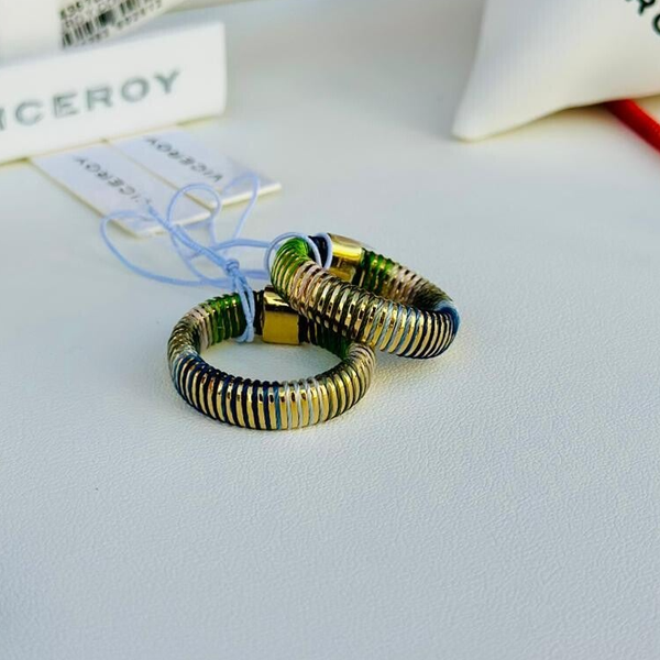 Anillo de acero tubogas con cordón enroscado, colección Laura Escanes