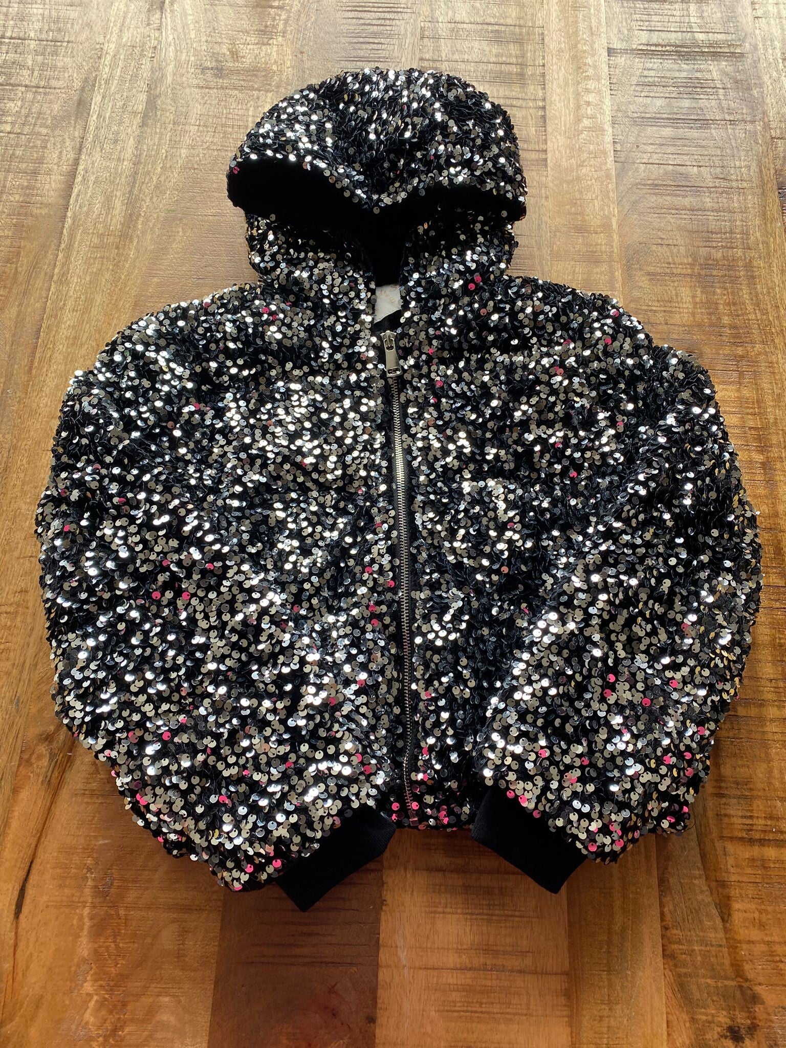 Laat je kleine meid Stralen in deze schitterende glitterjas!
