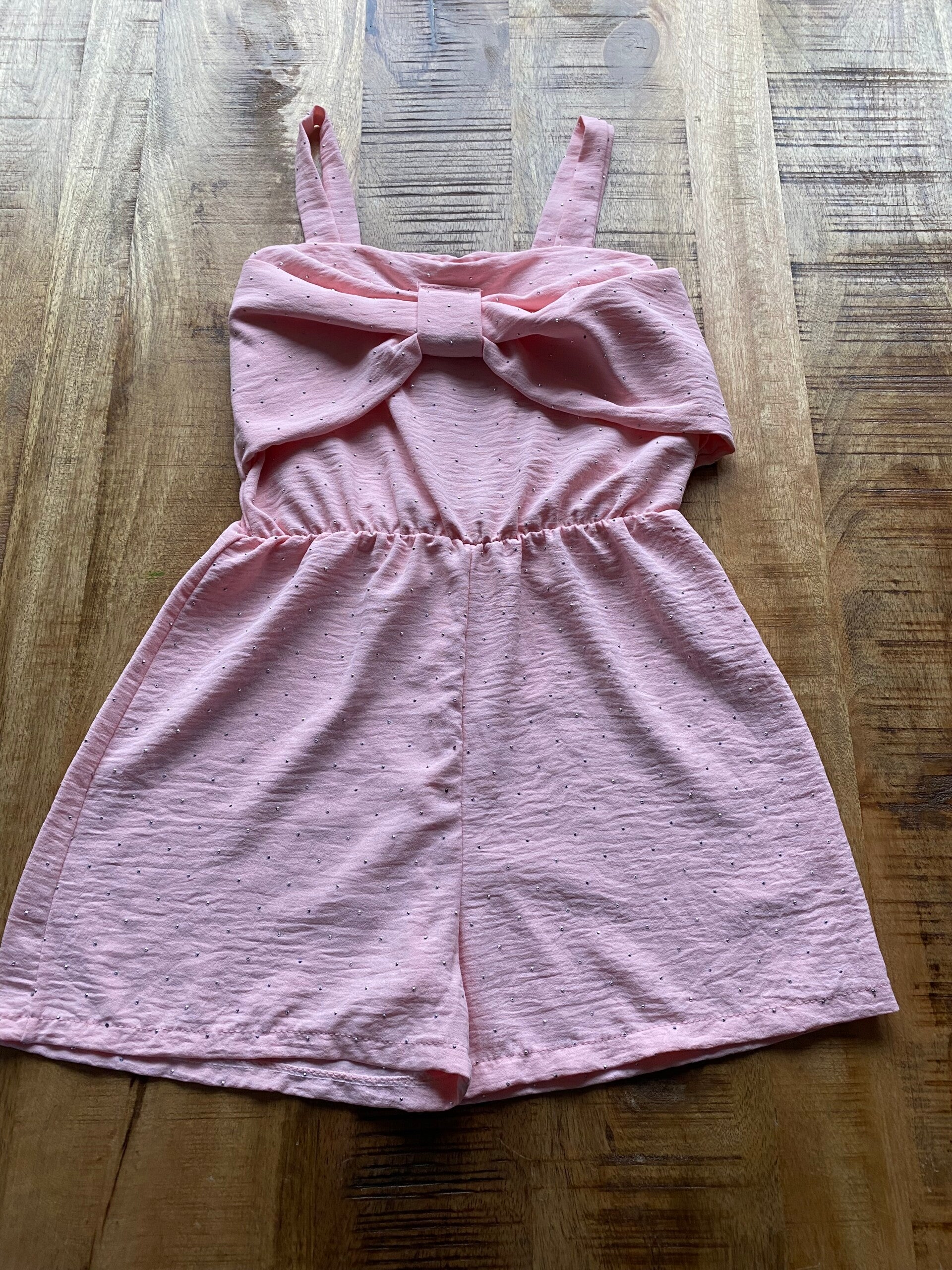 Jumpsuite strik roze met glitters