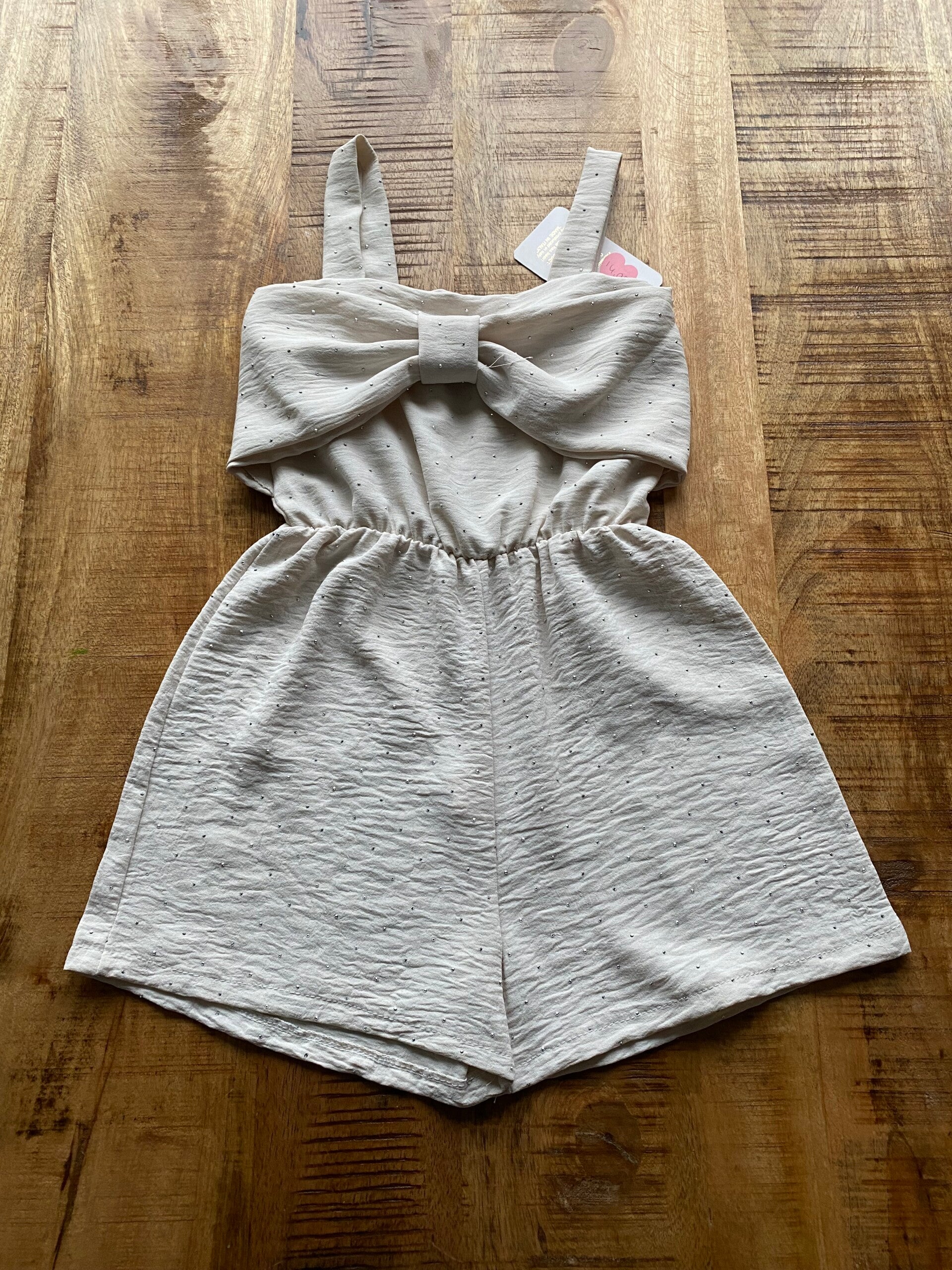 Jumpsuite strik beige met glitters