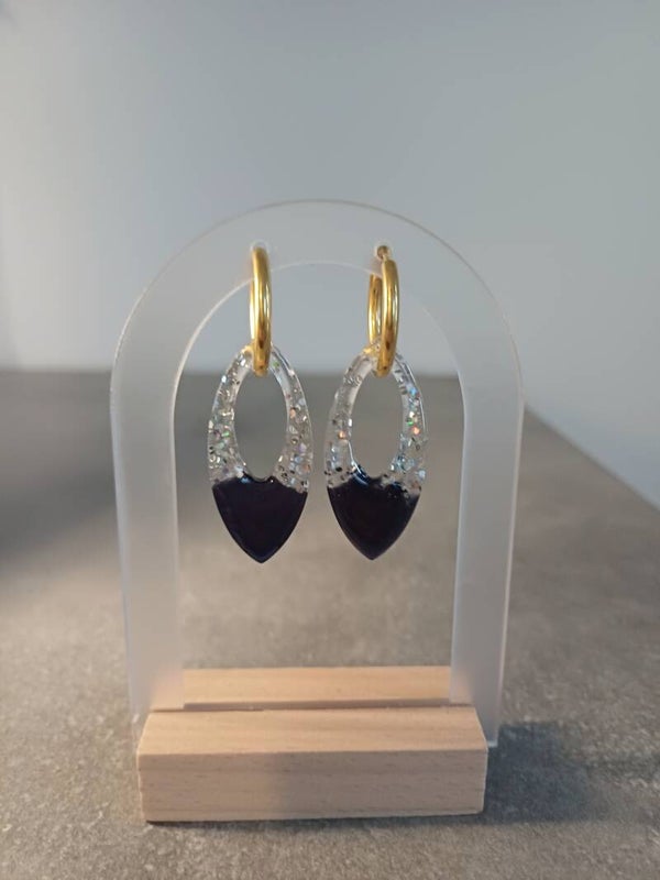 Ovales noires et transparentes à paillettes