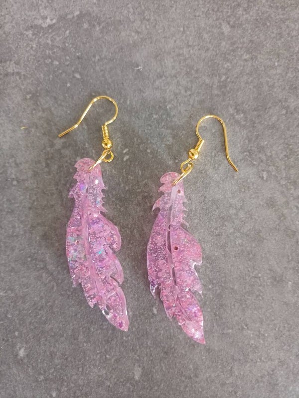 Plumes roses à paillettes