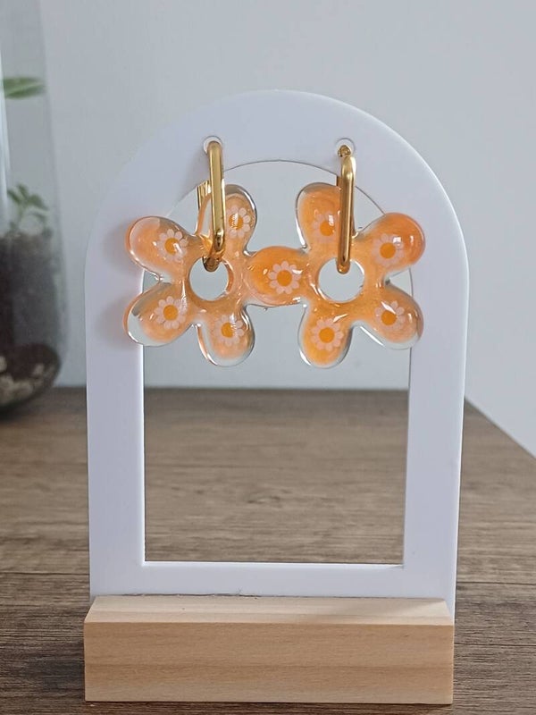 Grandes fleurs oranges et stickers marguerites