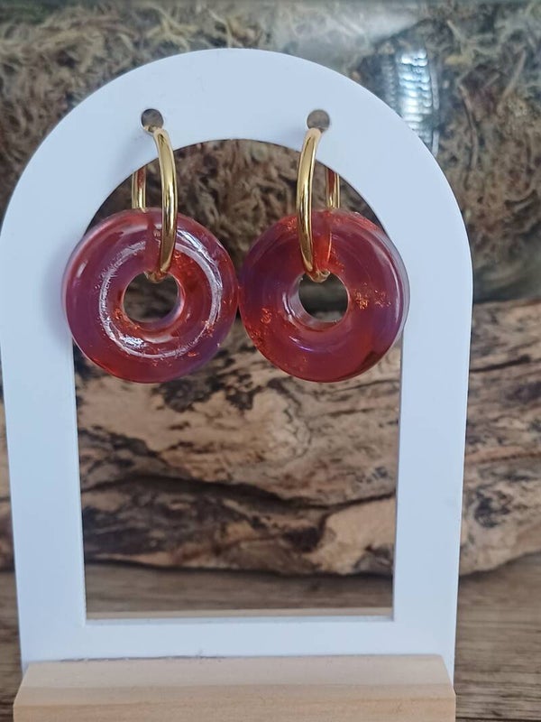 Donuts rouges violets et dorés