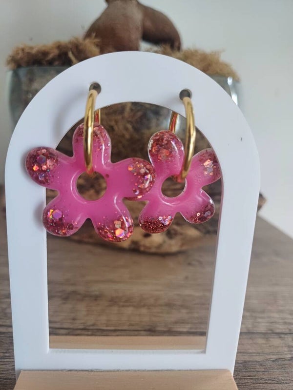 Grandes fleurs roses avec paillettes