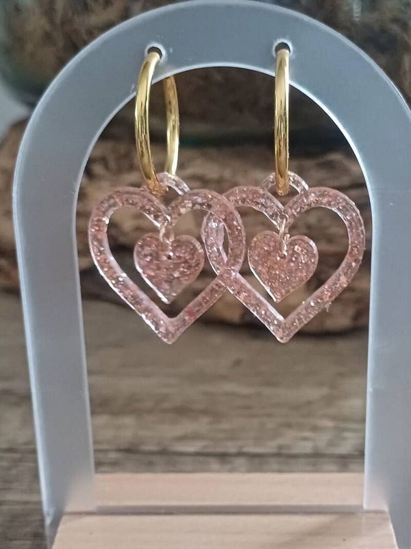 Doubles coeurs roses à paillettes