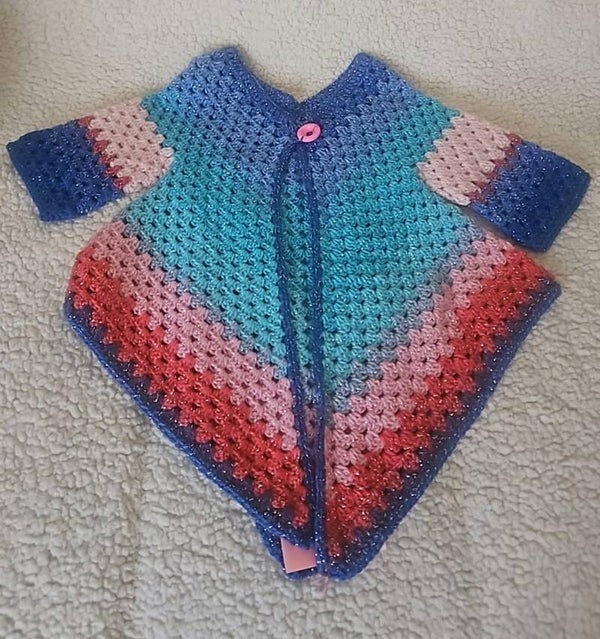Manteau triangle scintillant 3/4 ans