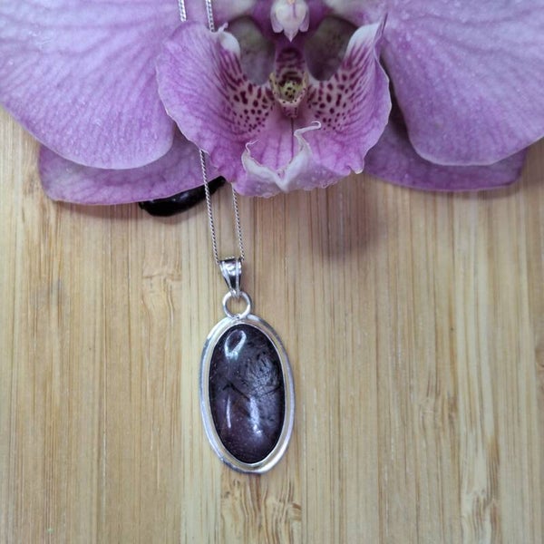 Pendentif en rubis avec papillon