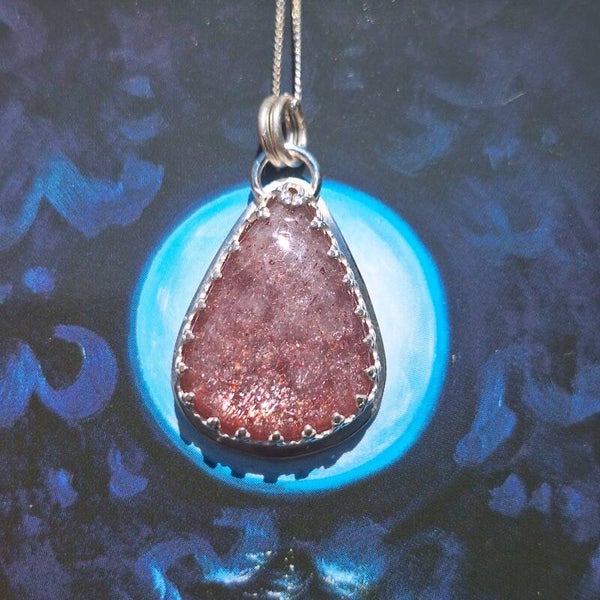 Pendentif iolite rose et colibri