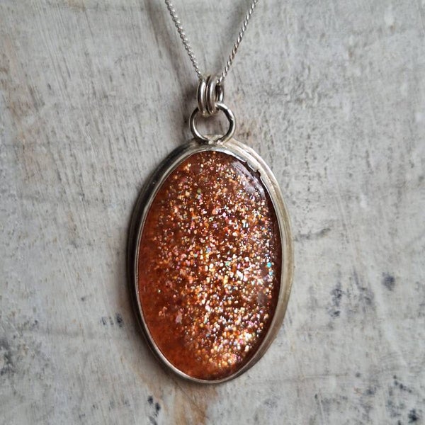 Pendentif pierre de soleil avec renard