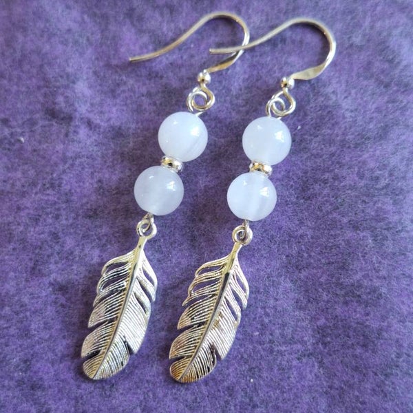 Boucles d'oreilles plume et manganocalcite