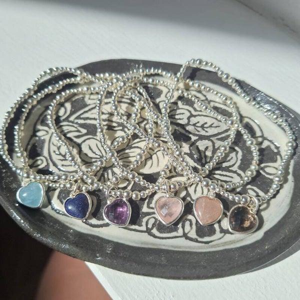Bracelet argent avec breloques coeur
