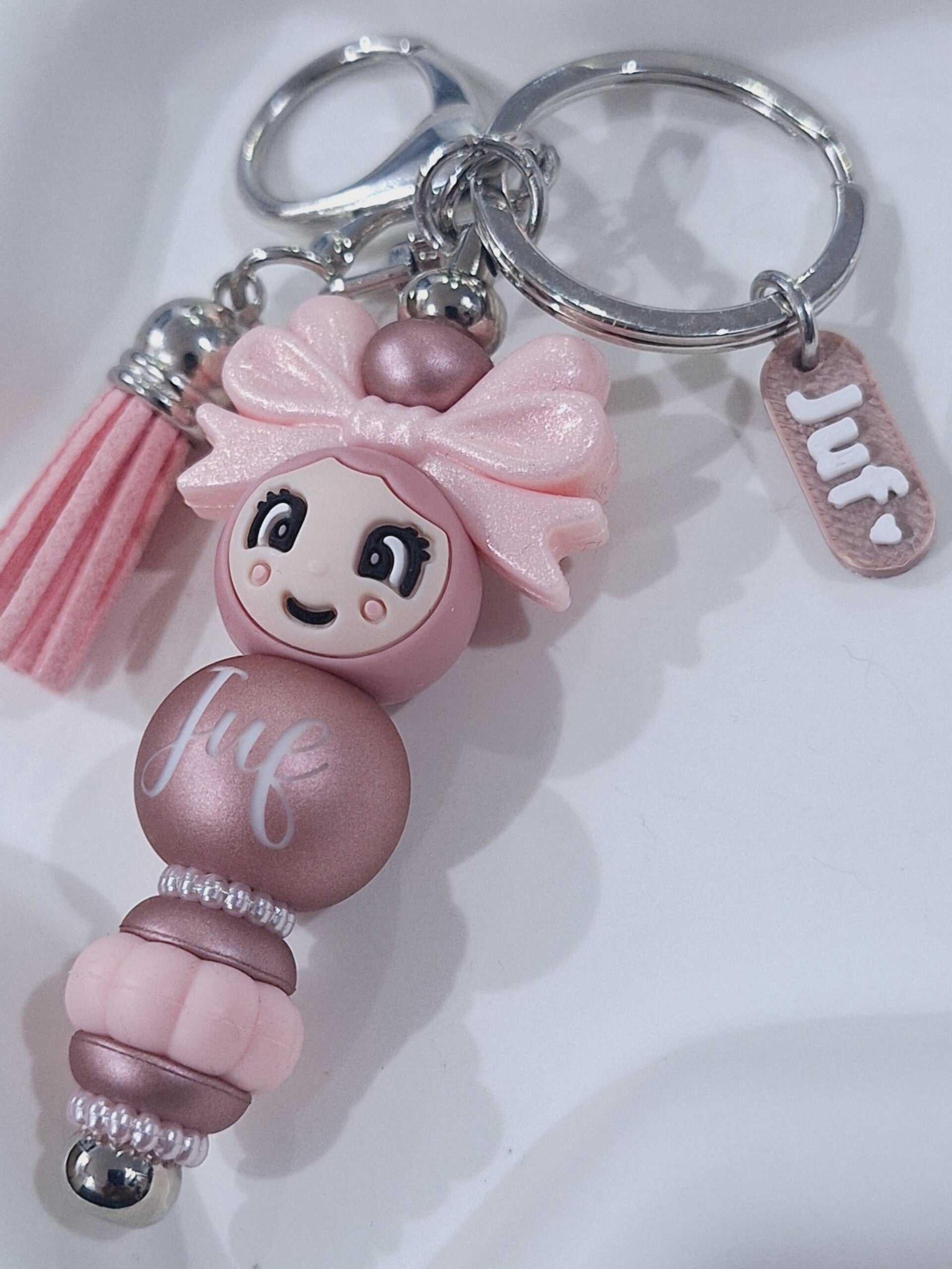 Gelukspopje sleutelhanger roze 'Juf'
