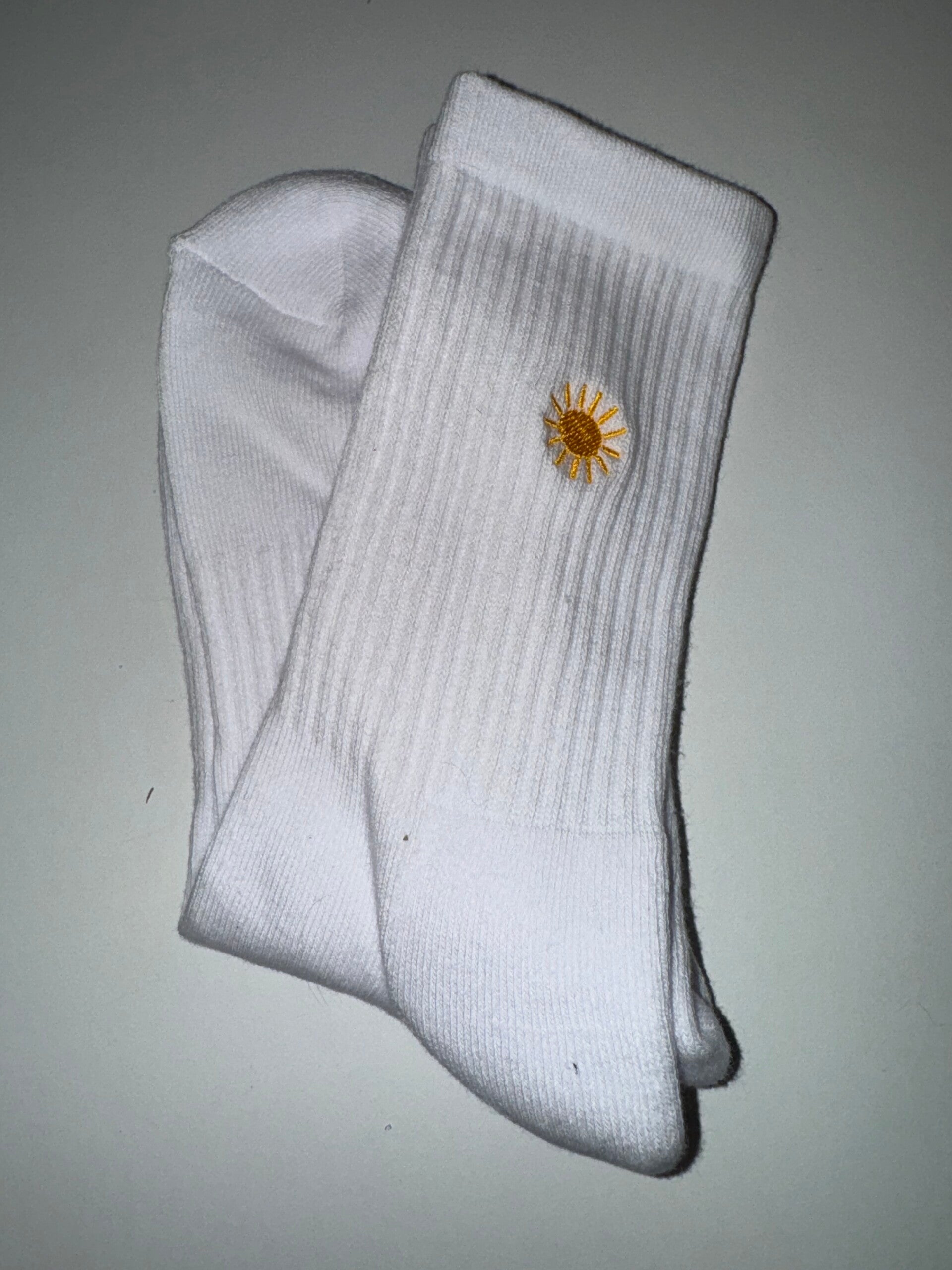 Geborduurde sokken - zonnetje