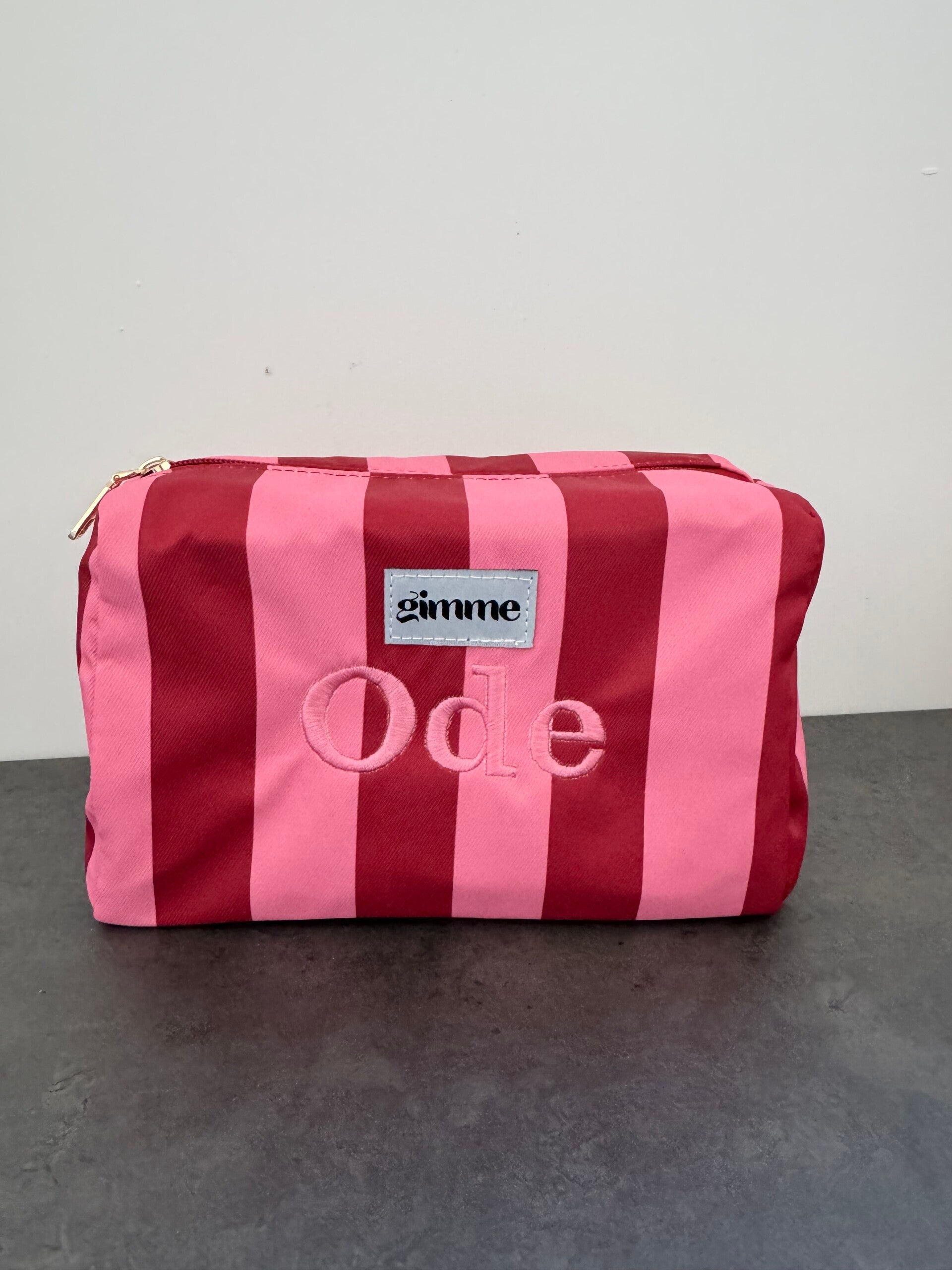 Make-uptas met roze en rode strepen – personaliseerbaar & praktisch