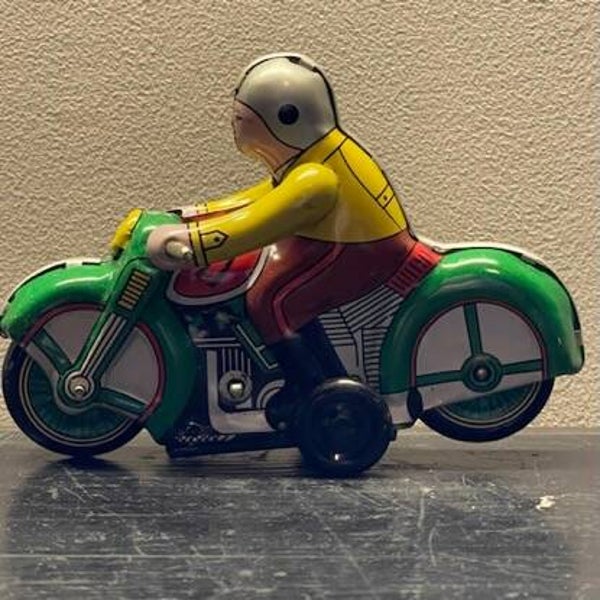 Blikken speelgoed  "Motorrijder Groen"
