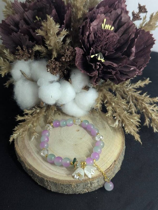 Armband Lila/Grün mit Anhänger "Lilie