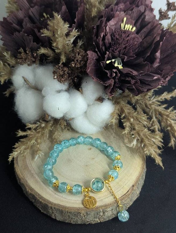 Armband Hellblau mit Anhänger "Glück"