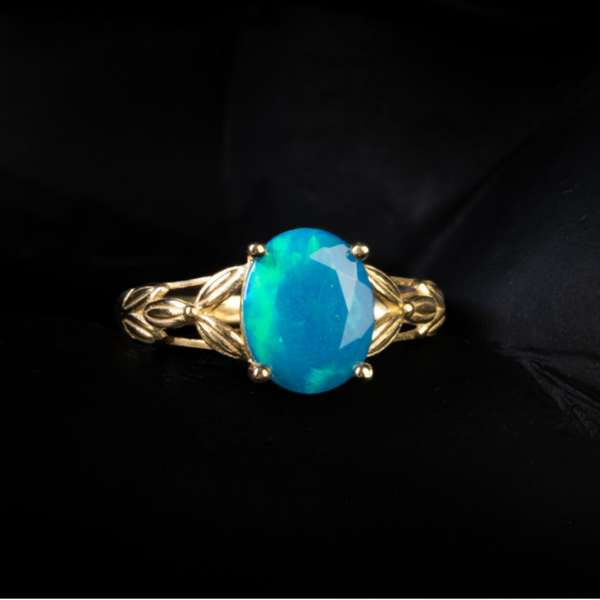 Pre-loved 9k ring met blauwe opaal