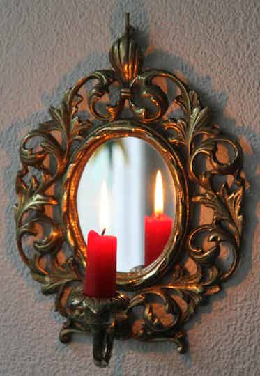 Spiegel um 1900 mit Kerzenhalter aus massiven Messing