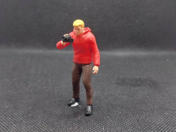 K015 Mann mit Camcorder