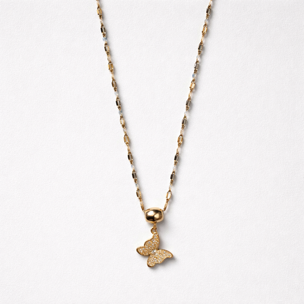 Fijne goud kleurig ketting met vlinder