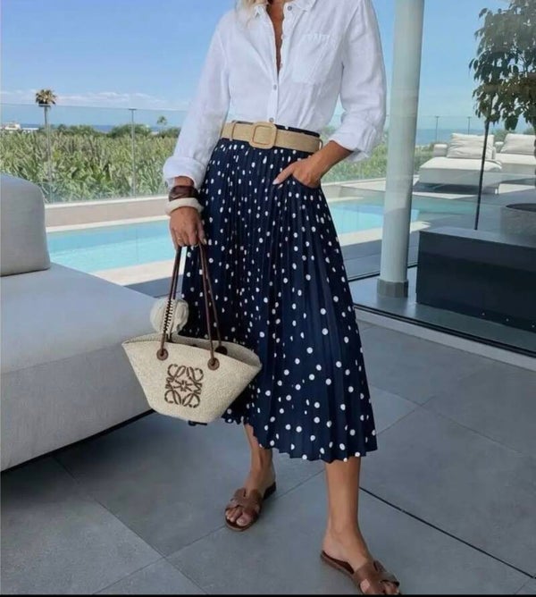 Geplisseerde rok met stippenprint en raffia-riem