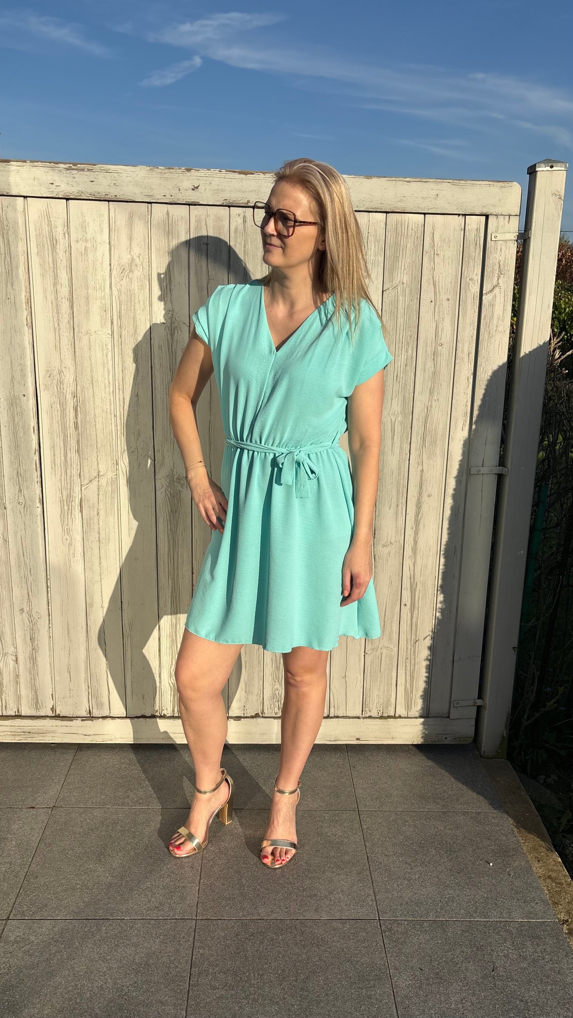 Turquoise jurk
