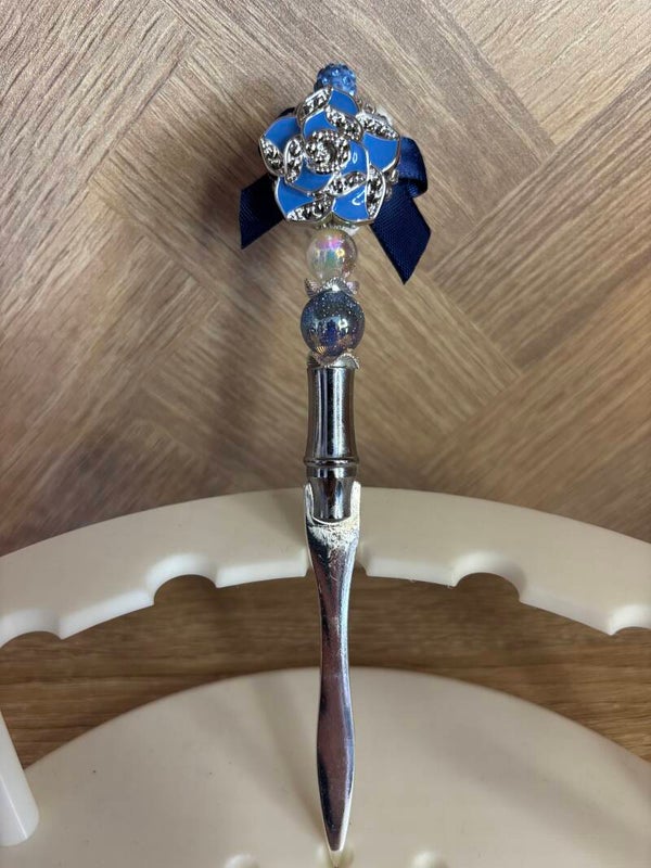 Blauwe bloem briefopener Zilverkleurig