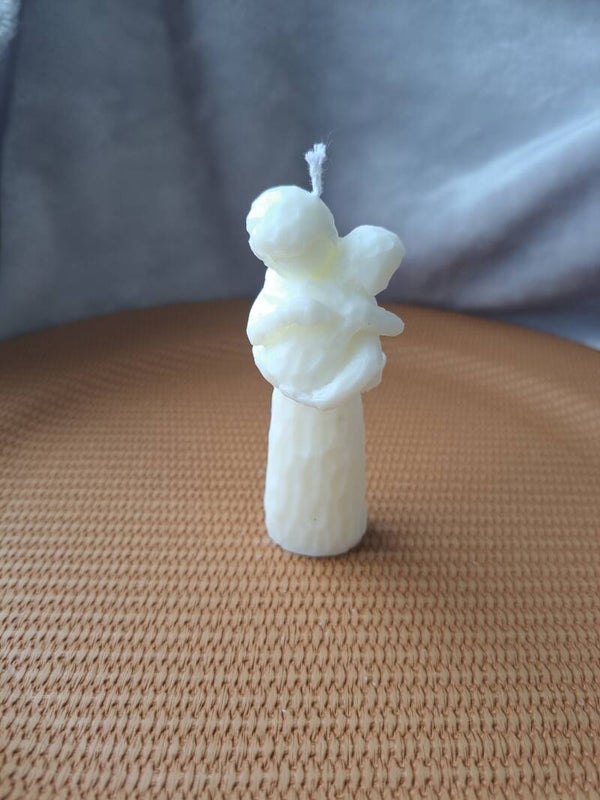 Frau mit Kind / Baby Kerze