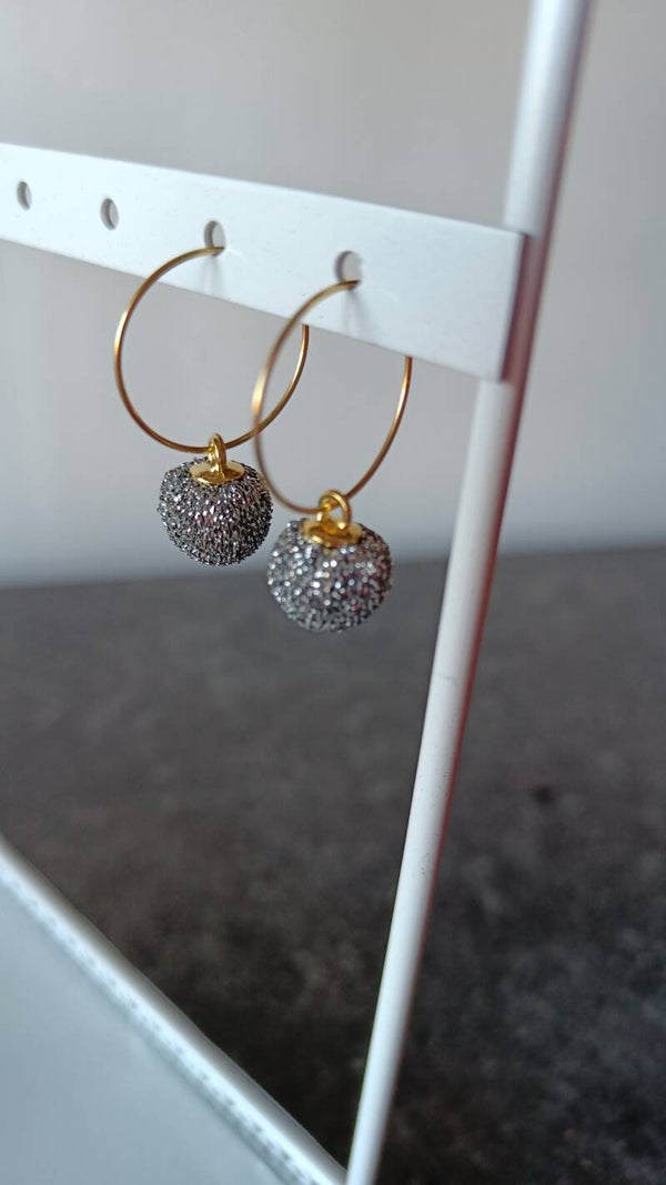 Oorbellen ( pompom zilverkleurig)
