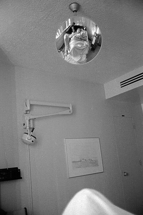 SELF PORTRAIT IN A MIRROR