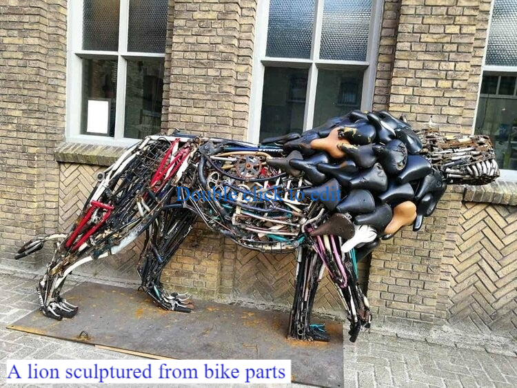 A lion sculpture made from bike parts.