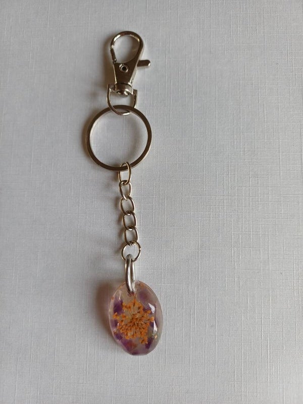 Sleutelhanger amethist, oranje bloem