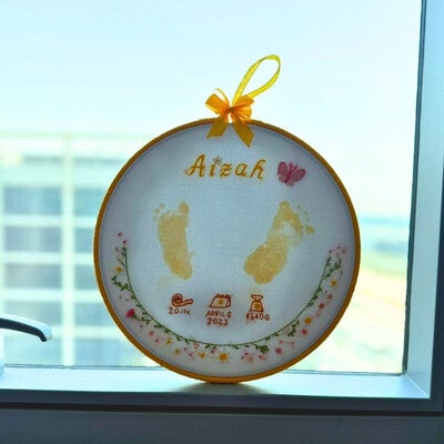 craftibu-website_testimonials-wall_feedback-welcome-baby-hoop-yellow-square-standard.jpg