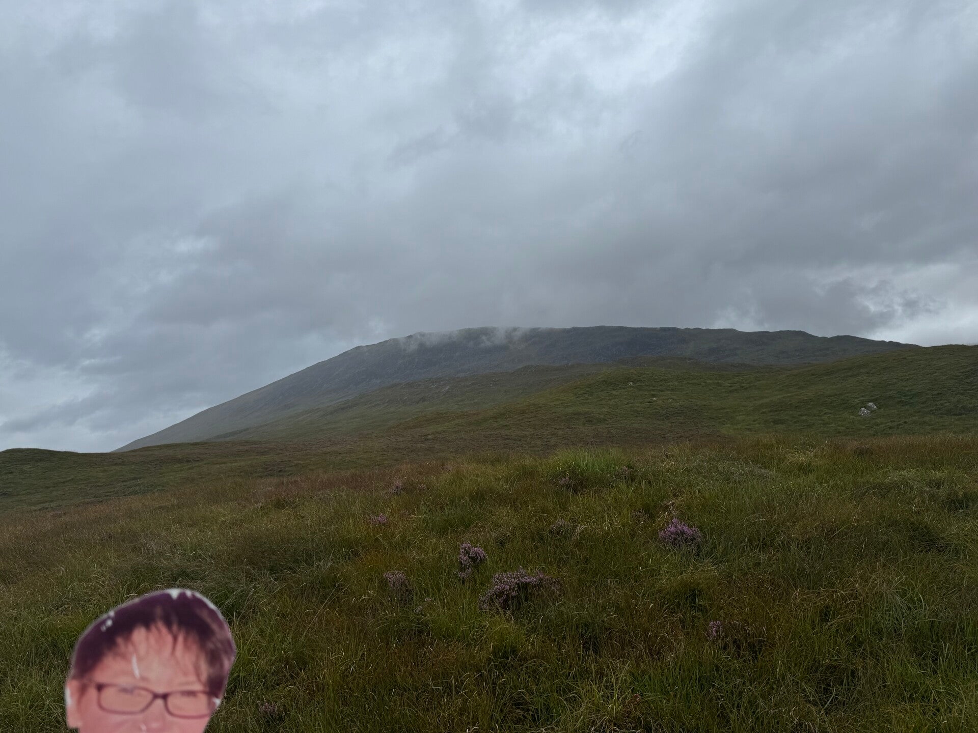 Ellen face on a hike in Scotland